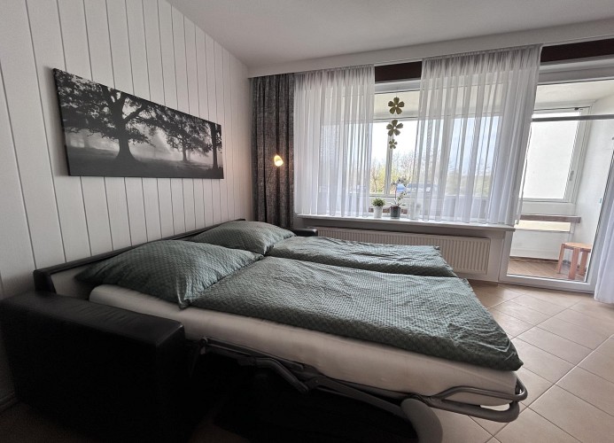 Haus Atlantic Whg.001, Strandhausallee 29, 27476 Cuxhaen Döse, Schlafsofa Wohnzimmer 